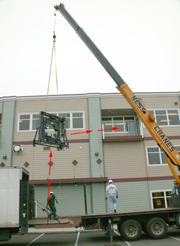 SIG being lifted by crane